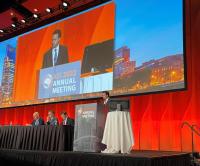 Dr. Brett Youngerman giving his presentation: "Medically Intractable Generalized Epilepsy"